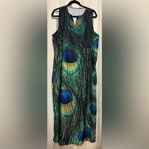 Elegant Peacock Print Dress. 45 “ from armpit.